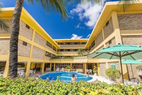 Indoor pool, outdoor pool, pool umbrellas, sun loungers