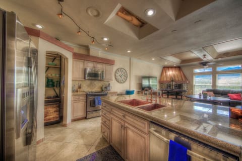 Gorgeous fully stocked well equipped kitchen for preparing a wonderful meal.