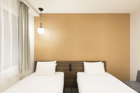 Twin Room | In-room safe, iron/ironing board, free WiFi, bed sheets