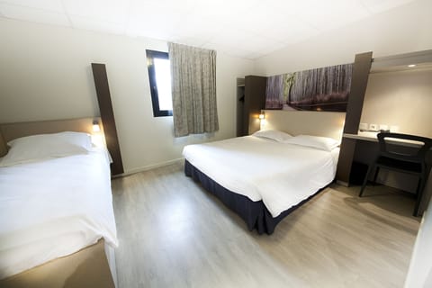 Comfort Quadruple Room | 1 bedroom, premium bedding, desk, blackout drapes