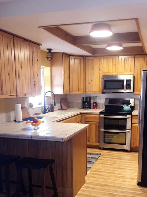 kitchen: coffee maker, blender, cast iron, dishwasher, microwave