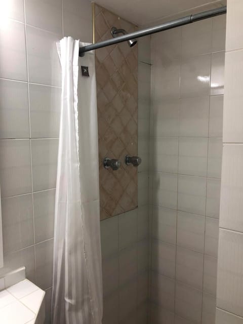 Bathtub, free toiletries, hair dryer, towels