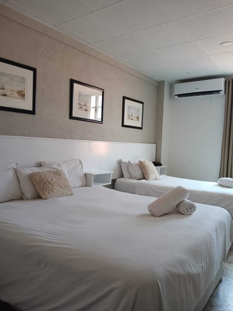 Family Triple Room, 1 Bedroom | In-room safe, iron/ironing board, free WiFi, bed sheets