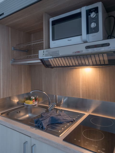 Studio, Balcony, Partial Sea View | Private kitchen | Full-size fridge, microwave, stovetop, espresso maker