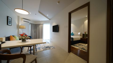 Suite, 1 Bedroom (guests age 18-59) | In-room safe, desk, blackout drapes, iron/ironing board