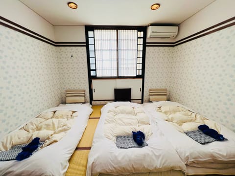 Japanese Style Room, 3 Guests | Desk, blackout drapes, free WiFi, bed sheets