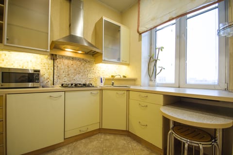 Apartment (Krasnaya street 22) | Private kitchen | Fridge, microwave, stovetop, electric kettle