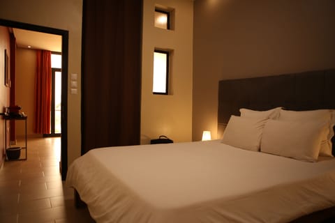 Premium Suite | Premium bedding, blackout drapes, soundproofing, free WiFi