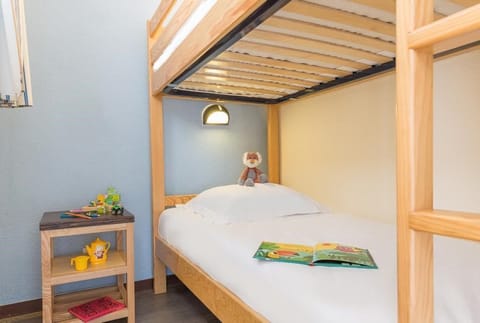 The sleeping alcove contains a Bunk bed.