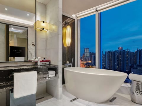 Luxury Room, 1 King Bed | Bathroom | Separate tub and shower, deep soaking tub, rainfall showerhead
