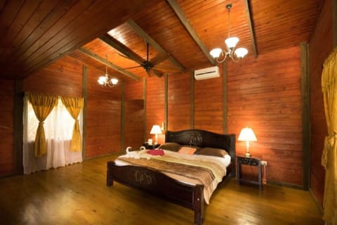 Deluxe Cabin, 1 King Bed | Down comforters, pillowtop beds, in-room safe, individually furnished