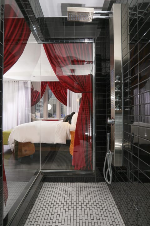 Suite | Bathroom | Shower, designer toiletries, hair dryer, towels