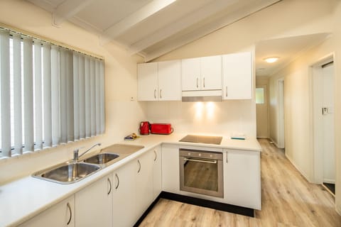 Deluxe Cabin, 2 Bedrooms | Private kitchen | Microwave, stovetop, cookware/dishes/utensils