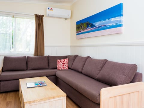 Beachside Family Suite (3BR) | Living room | TV, DVD player