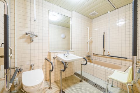 Accessible Room (With bath) Non Smoking | Bathroom | Free toiletries, hair dryer, slippers, towels