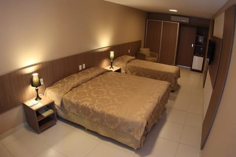 Luxury Room | Minibar, blackout drapes, free cribs/infant beds, free WiFi