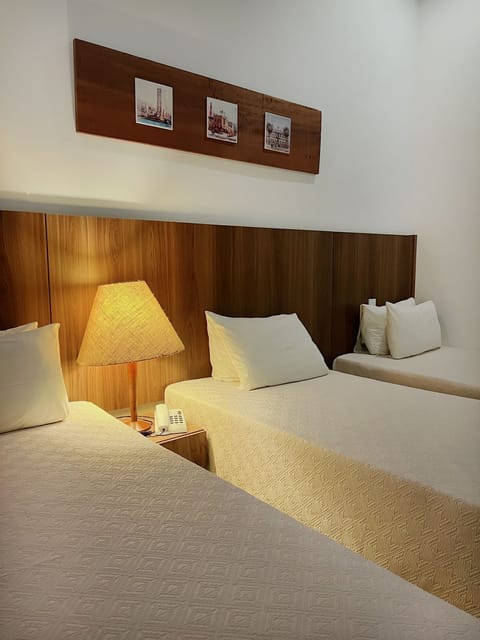 Deluxe Triple Room | Pillowtop beds, minibar, in-room safe, free WiFi