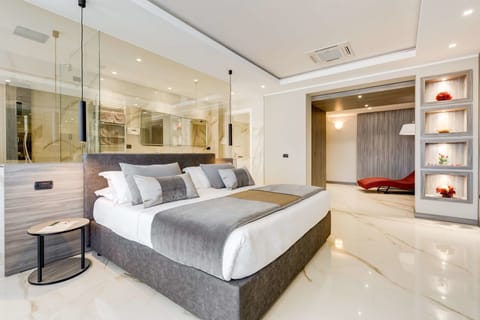 Suite, 1 King Bed, Balcony (Living Room) | 8 bedrooms, minibar, in-room safe, desk