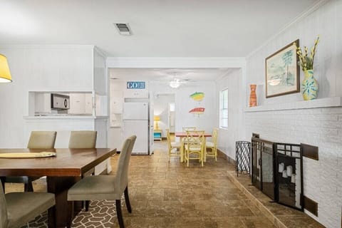 Looking into the kitchen with additional dining space
