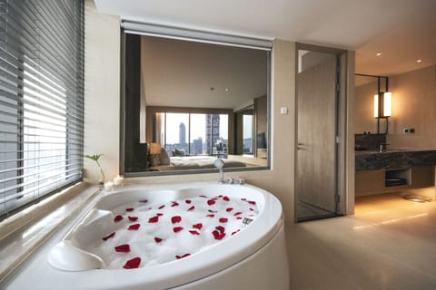 Roselle Suite, 1 Bedroom Corner Suite | Bathroom | Separate tub and shower, deep soaking tub, rainfall showerhead