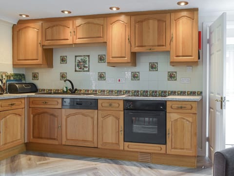 Well-appointed kitchen area | Lorna’s At The Grange - Grange Country House Holiday Cottages, Loweswater, near Cockermouth
