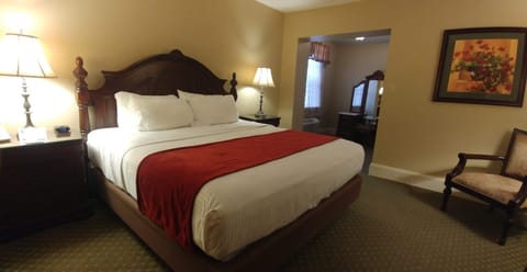 Deluxe Room, 1 King Bed | In-room safe, iron/ironing board, free cribs/infant beds, free WiFi