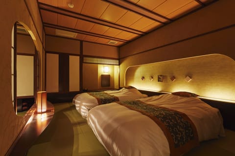 Deluxe Room with Tatami area and Open Air Bath, City View | Minibar, in-room safe, iron/ironing board, free WiFi