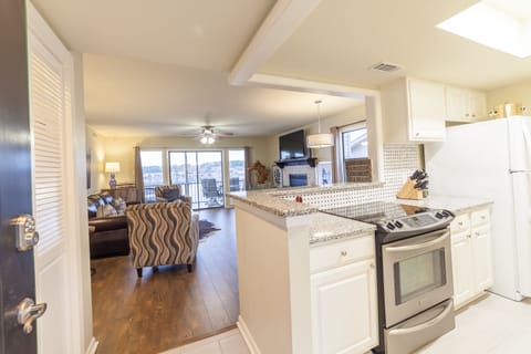 Walking in the front door, you're greeted with the open kitchen and living room.