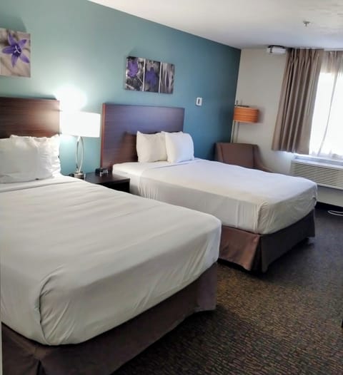 Premium bedding, pillowtop beds, desk, laptop workspace