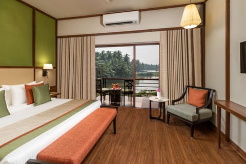 Pond Facing Suite Room with Balcony | Egyptian cotton sheets, premium bedding, minibar, in-room safe