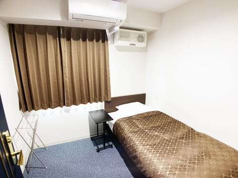 Economy Single Room, Men only | Desk, free WiFi, bed sheets