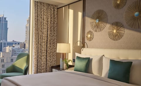 Executive Suite | Premium bedding, minibar, in-room safe, individually decorated