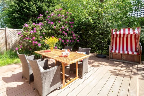 Terrace and beach chair at the holiday apartment Skagen in the forest in Nebel