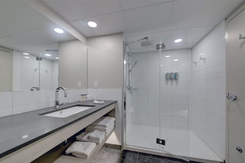 Exclusive Room, Refrigerator & Microwave | Bathroom | Combined shower/tub, free toiletries, hair dryer, towels