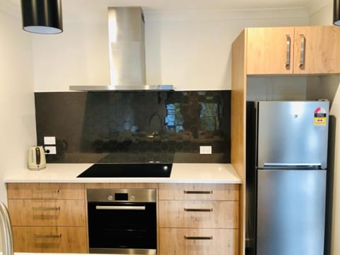 Premium Townhome, 3 Bedrooms, 2 Bathrooms (Gemini B) | Private kitchen | Full-size fridge, microwave, oven, stovetop