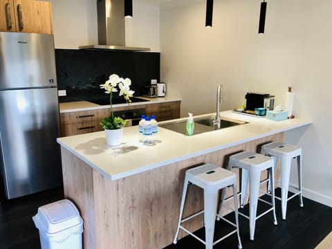 Premium Townhome, 3 Bedrooms, 2 Bathrooms (Gemini A) | Private kitchen | Full-size fridge, microwave, oven, stovetop