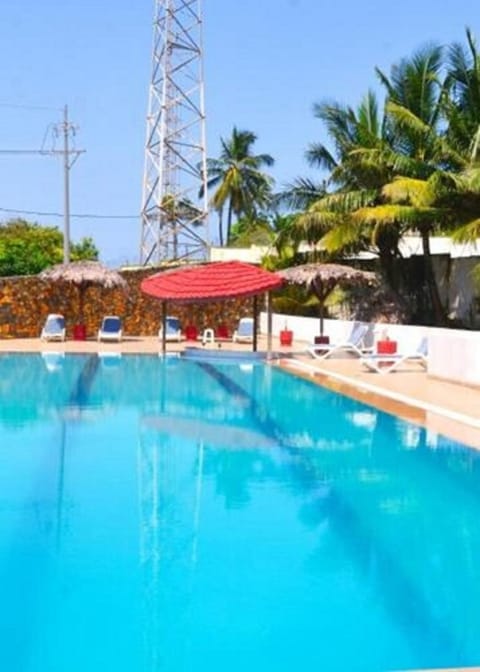 Indoor pool, open 6:00 AM to 7:00 PM, pool umbrellas, sun loungers