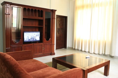 Family Suite | Living area | TV