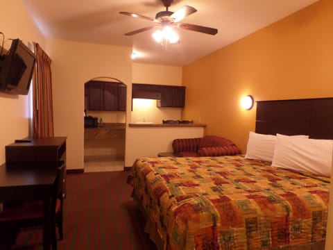 Deluxe Suite, 1 King Bed, Non Smoking, Kitchenette | Desk, blackout drapes, iron/ironing board, free WiFi