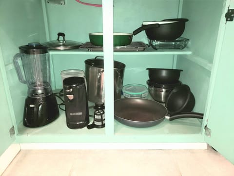 Lightly Stocked with Pots, Pans, Mixing
Bowls, Blender, Can Opener....