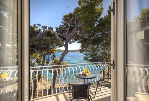 Superior double room with seaside balcony | Premium bedding, in-room safe, desk, free WiFi