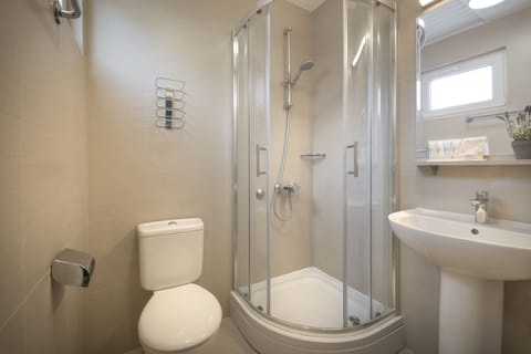 Shower, free toiletries, hair dryer, towels