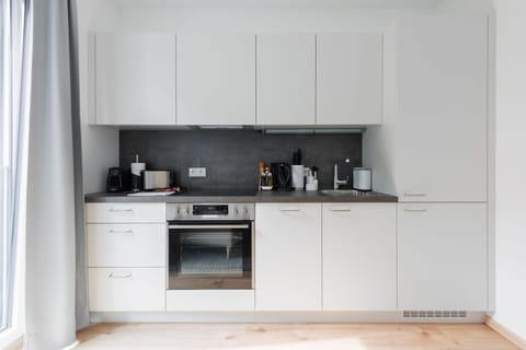 Suite M | Private kitchen | Fridge, espresso maker, electric kettle, toaster