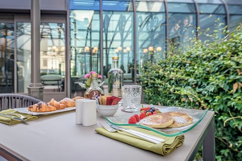 Daily buffet breakfast (EUR 28 per person)