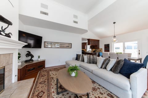 Beautiful bright and open living room with an abundance of natural light & views