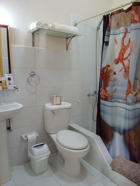 Family Room (#2) | Bathroom | Combined shower/tub, rainfall showerhead, free toiletries, hair dryer