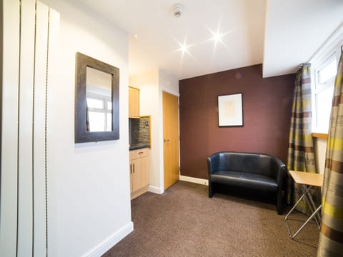 Premium bedding, desk, blackout drapes, iron/ironing board