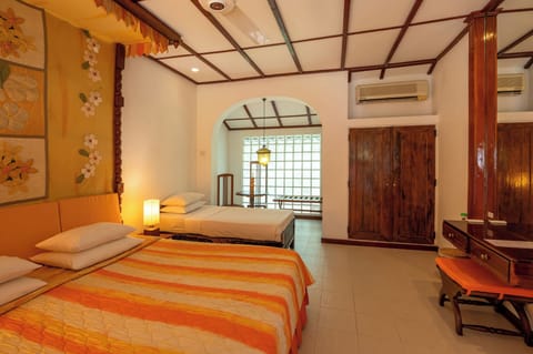 Superior Triple Room, 1 Bedroom, Private Bathroom, Garden View | Minibar, in-room safe, desk, laptop workspace