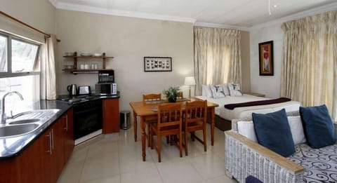 Family Suite (Penthouse) | Living area | Flat-screen TV