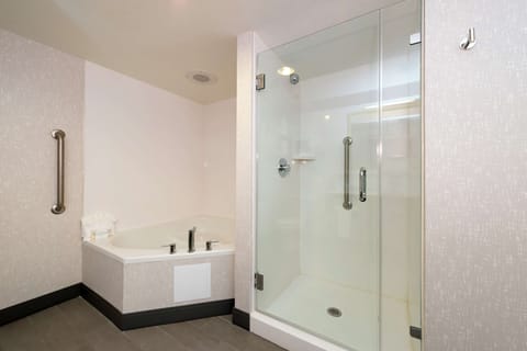 Room, 1 King Bed, Bathtub | Bathroom | Combined shower/tub, free toiletries, hair dryer, towels